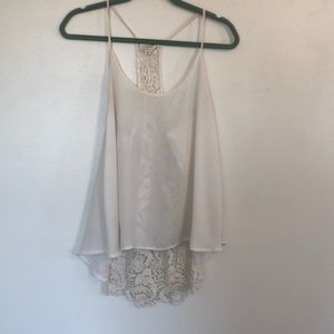 Cream razor back tank top. La hearts size medium